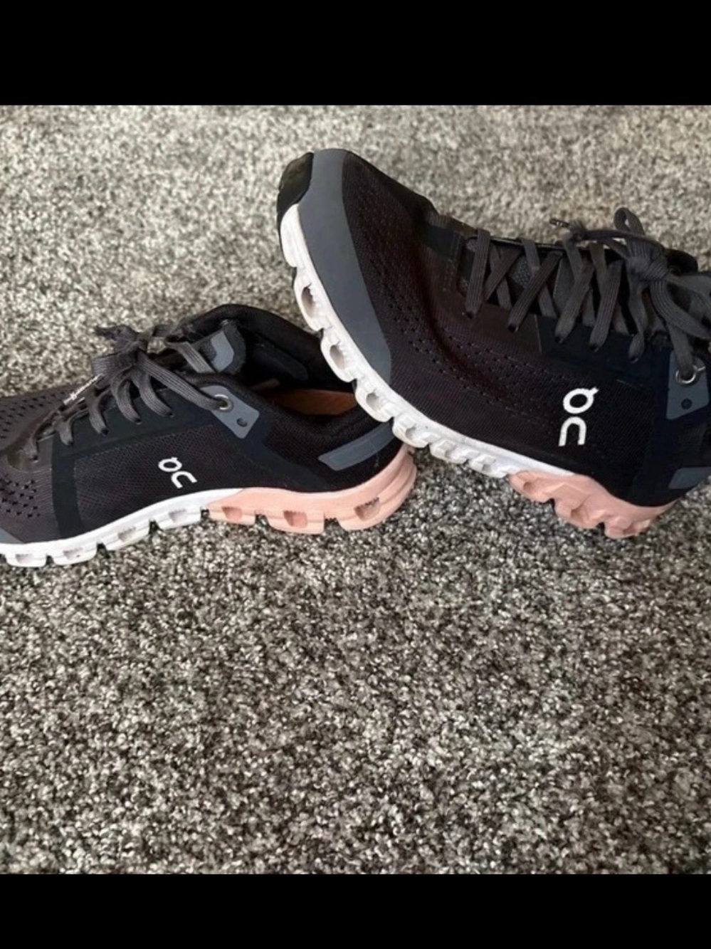 On Running Women's Black Running Shoes with Pink Midsole